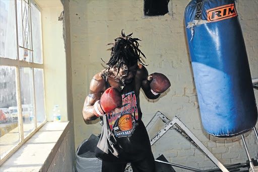 Gabonese boxer Patrick Mavoungou shows his form in the Hillbrow Boxing Club.