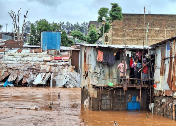 Residents of Mradi, Mathare 4A in Nairobi stuck after heavy downpour on April 23, 2024.