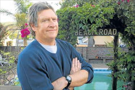 LAYERED TALE: The rough, tough story underlying the exuberant beach lifestyle of business suburb Nahoon in East London is told by one of its residents, researcher, writer and surfer Glenn Hollands. The author of ‘The Reef: A Legacy of Surfing in East London’, has opted for a crowd-funding style to raise money to publish his latest book, ’Fun and Fighting at Nahoon’ top right. After research in museums and people's kists, Hollands put together a tale of Xhosa-colonist battling it out in the bush, mysterious hotel murders and how people came to live here Picture: MIKE LOEWE