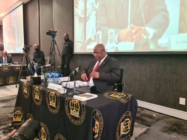Acting chief justice Raymond Zondo prepares to answer questions during the Judicial Service Commission interviews for the country's next chief justice.