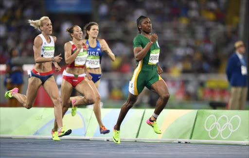 South Africa's Caster Semenya (R) competes in the Women's 800m Semifinal during the athletics event at the Rio