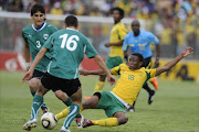 A file picture of Kamal Issa and Kamohelo Mokotjo during the 2012 London Olympic Qualifier match between South Africa U/23 and Libya U/23 at Sinaba Stadium on March 27, 2011 in Benoni. File photo
