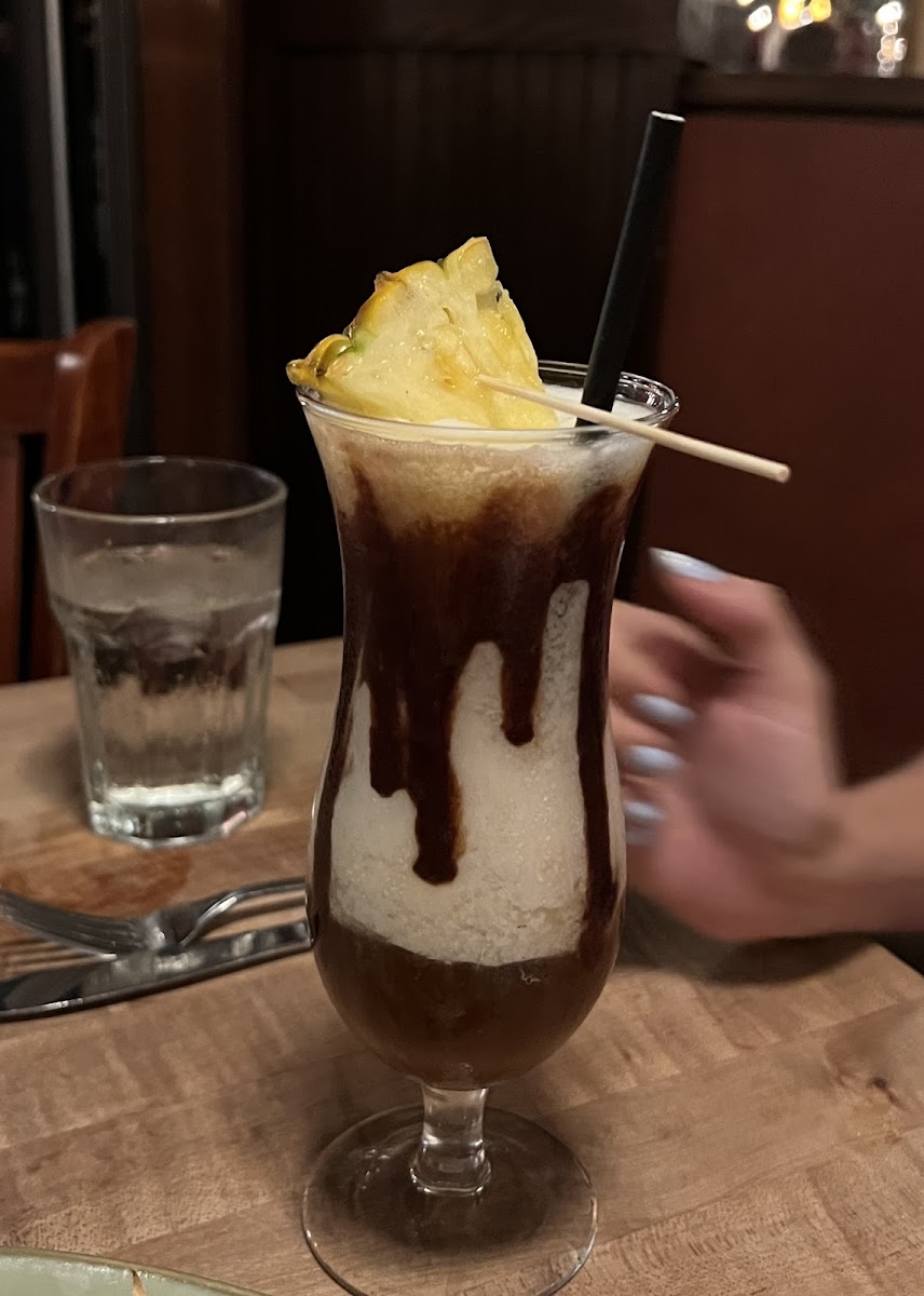 Piña colada eith chocolate syrup (closest thung thry could make to a mudslide)