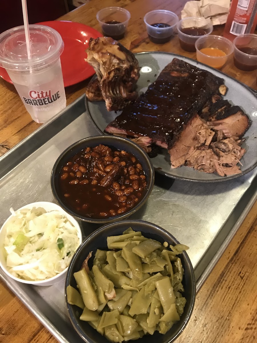 The judges sampler- Pulled pork, brisket, ribs, 1/4 chicken with 2 large portion sides and add vinegar slaw.