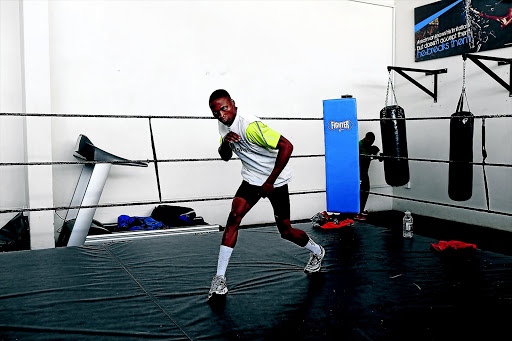 Zolani Tete has been praised as a dedicated, hard-working boxer . / ALON SKUY