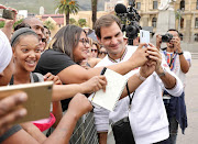 Selfie time for Roger Federer and one of his Cape Town fans on the Grand Parade on February 7 2020.
