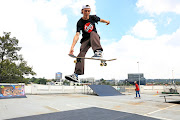 Calvin Kotze skateboarding at Air360 at Eastgate Shopping Mall in Johannesburg. Air360 is an outdoor skating facility that caters for people of all ages where expert skaters teach people from scratch. 