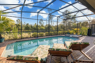 South-facing private pool and spa at this Windsor at Westside vacation villa in Kissimmee