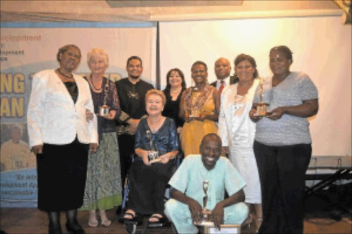 NOBLE TRADITION: Back: Deputy Minister for Social Development Maria Ntuli, Petro Raath, Alvin Botes, Hazel Jenkins, Dineo Leutwile, Jerome Crowder, Alexandra Beukes and Mercia Pheza. Seated: Dorothy Howitson. Front: Tony Kok.