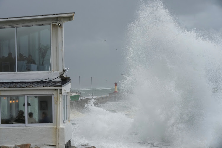 Rough seas crash into Kalk Bay harbour amid warnings for gale-force winds, heavy rain and rough seas from a cut-off low-pressure system moving into the country. Picture: REUTERS/Nic Bothma