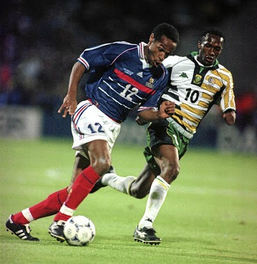 Thierry Henry of France tries to get past SA's John Moshoeu at the 1998 World Cup in France.