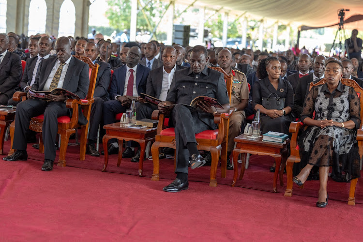 President William Ruto reads the eulogy of Mama Annah Tikui Noolparakuo Tunai Mother to Former First Governor of Narok Samwel Tunai in Narok on March 18, 2024