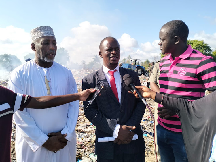 Lamu Court Users Committee member and cleric Mohamed Abdulkadir and Lamu Law Courts Senior Principal Magistrate Sitati Temba speaking to journalists shortly after overseeing the destruction of Sh2.6 million narcotics and over 10,000 old court records, on September 1, 2023.