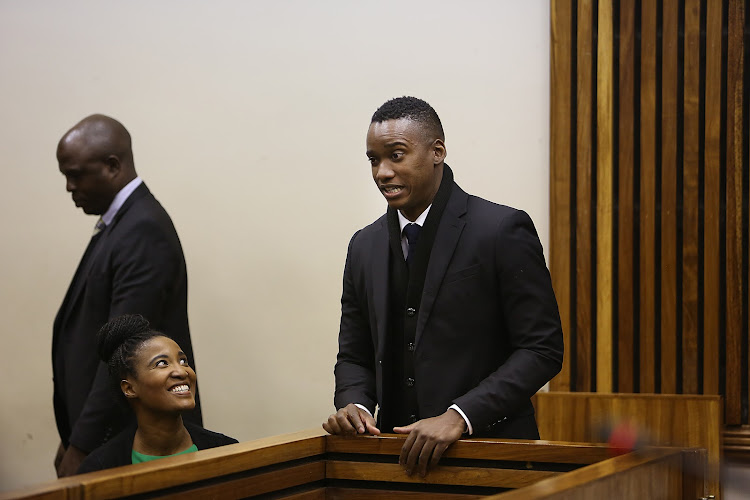Duduzane Zuma and his sister, Duduzile, share a moment of relief after hearing the verdict.