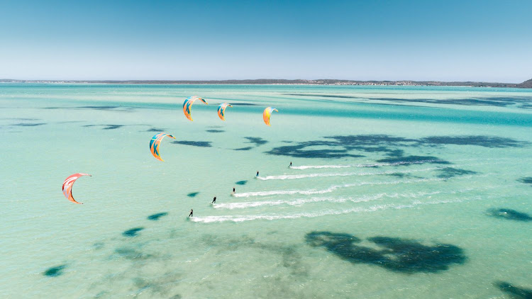 Langebaan lagoon draws kite surfers from across the globe and is widely acknowledged as one of the best places on the planet to learn how to kite-surf.