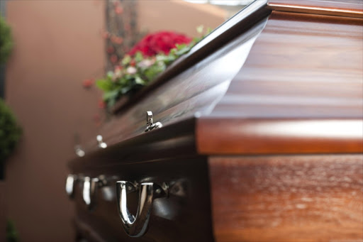 A woman gave birth inside a coffin 10 days after her death. Both the stillborn infant and the mother were buried in one big coffin on Saturday. File photo.