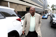 KwaZulu-Natal ANC deputy chairperson Mike Mabuyakhulu leaves the Durban Commercial Crime Court on August 22, 2018. He's facing charges of fraud, corruption, theft and money laundering.