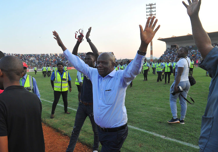 Black Leopards chairman and owner David Thidiela celebrates with fans after his team won promotion to the Absa Premiership following a win over Jomo Cosmos at Thohoyandou Stadium on May 30 2018.