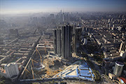 A construction site of high-rise buildings is seen in the middle of the city in Shenyang, Liaoning. China's economic growth slowed in the third quarter to its weakest since the 2008/09 global financial crisis. Picture Credit: Reuters