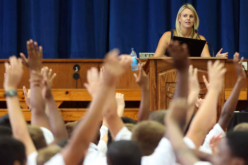 ANTISOCIAL MEDIA: Author and social media law expert Emma Sadleir gets a response from Selborne Primary pupils during her address on the dangers of social media indiscretions Picture: ALAN EASON