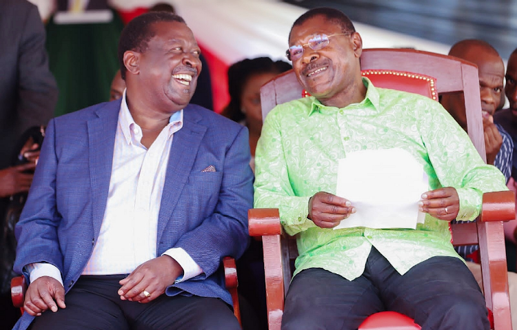 Prime Cabinet Secretary Musalia Mudavadi and National Assembly Speaker Moses Wetang'ula during a fundraiser for Silungai Boys High School in Malava subcounty. Were Mudavadi wiser, he would remain put in ANC.