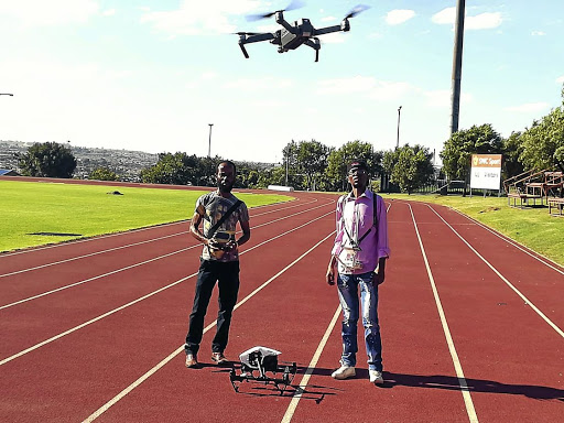 Flight Mode Productions partners Kgolane Moruthane and Kabelo Afrika fly their commercial drone.