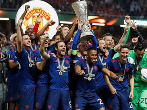 Manchester United players celebrating their win./DAILY MAIL