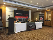 Sexual abuse survivor Debbie Wade, right, addresses a press conference in Johannesburg on Tuesday afternoon with Women and Men against Child Abuse officials Miranda Jordan and Luke Lamprecht.