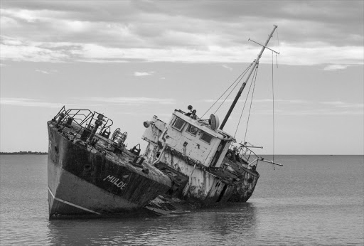 File photo of a sinking fishing boat.