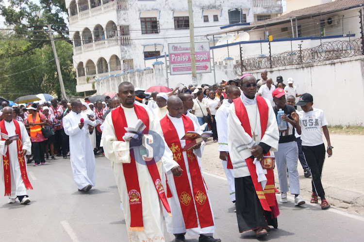 Bishop Martin Kivuva lead the procession to mark the crucifixion of Jesus Christ along Mombasa's Nkurumah road on March 29, 2024.