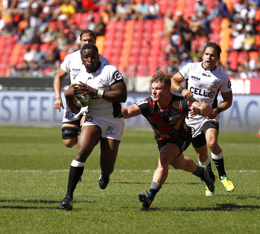 Lwazi Mvovo of the Cell C Sharks breaks a tackle during the 2016 Super Rugby match between Southern Kings and Cell C Sharks at Nelson Mandela Bay Stadium on February 27, 2016 in Port Elizabeth, South Africa.