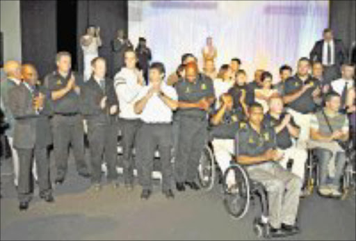 FLYING FLAG: 11 June 2008, Athletes during the South African Paralympic team announcement held at the SASCOC Auditorium in Johannesburg, South Africa.\nPhoto by Duif du Toit / Gallo Images\n\n