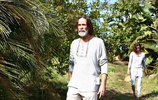 Controversial KwaZulu-Natal guesthouse owner Andre Slade‚ who is facing hate speech charges over his views that whites are superior to blacks‚ plans to sue the government and media for branding him a racist.