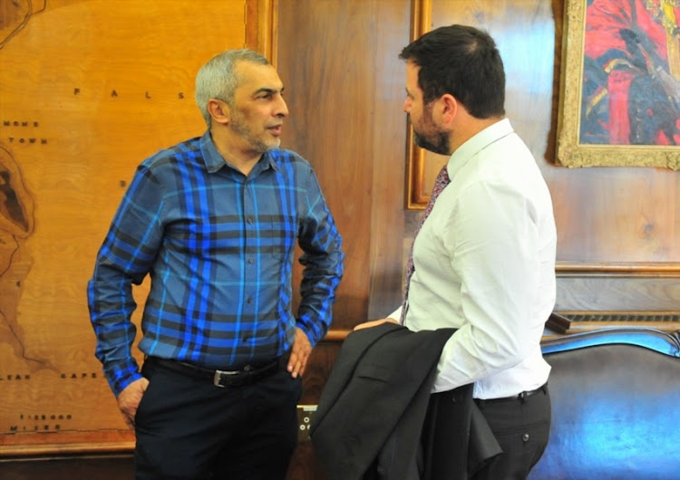 Farook Kadodia (Chairman) chats with Councillor Stuart Diamond (Mayoral Committee Member for Assets and Facilities Management) during the Maritzburg United Media Conference at City Hall on May 14, 2018 in Cape Town, South Africa.