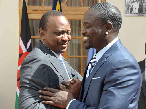 A file photo of President Uhuru Kenyatta with musician Akon at State House in Nairobi.