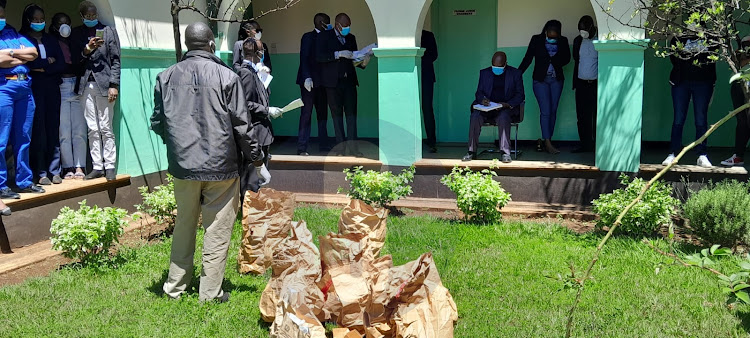 A court proceeding outside Eldoret High Court where samples taken from the suspect and deceased were displayed on May 7, 2024.