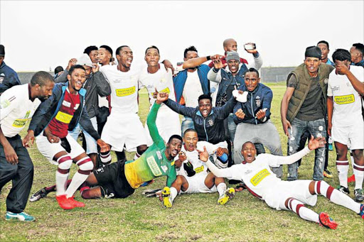 SWEET VICTORY: EC Bees players celebrate after a convincing 2-0 win over Future Tigers in their ABC Motsepe League title deciding game at the Bhisho stadium on Saturday Picture: Picture: RANDELL ROSKRUGE
