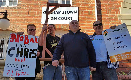 OPPOSING BAIL: Self-styled ‘hangman’s group’ Paul Potgieter, Koos Oliphant and Victor Tansell are joined by Afriforum’s Kobus Gerber to celebrate Chris Panayiotou’s failed bail appeal Picture: ADRIENNE CARLISLE