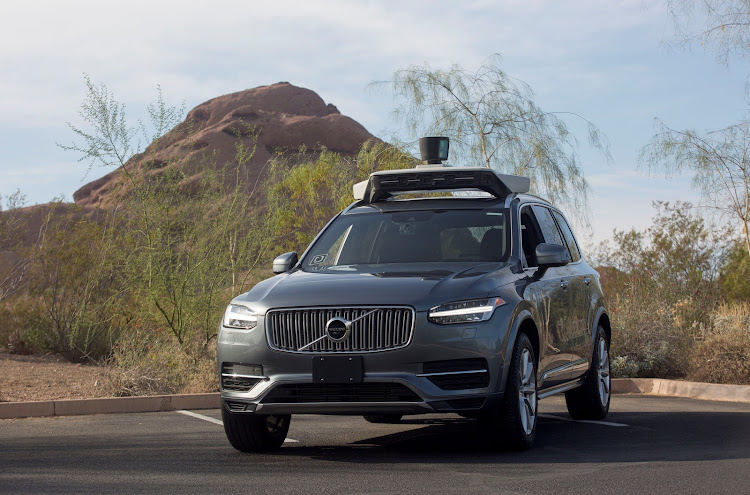 A self driving Volvo vehicle, purchased by Uber, sits in a parking lot in Phoenix, Arizona, US, December 1, 2017.