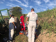 IPSS Medical Rescue paramedics treat a critically injured farm worker who was crushed by a rolling trailer. 