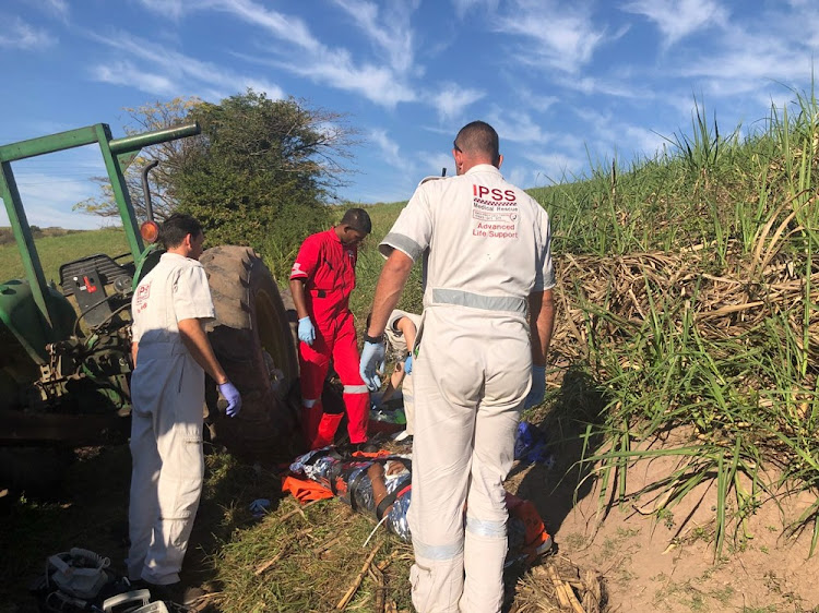 IPSS Medical Rescue paramedics treat a critically injured farm worker who was crushed by a rolling trailer.