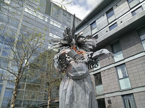 Feathered Hat Statue