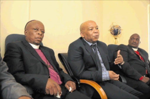 MEN OF THE CLOTH: Mayor of Tshwane Kgosientso Ramokgopa with Bishop Calib Makhanda and Bishop Solly Lalamani in Roslyn, Pretoria. Photo: Tsheko Kabasia