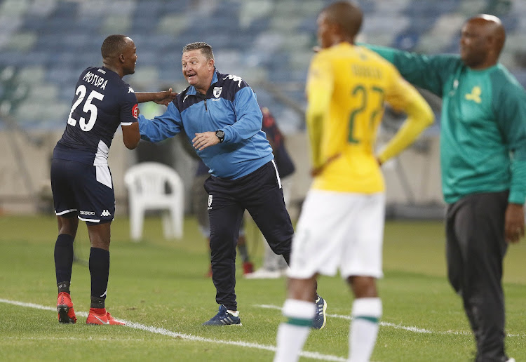 Gavin Hunt with Gift Motupa of Bidvest Wits during the Absa Premiership match between Bidvest Wits and Mamelodi Sundowns at Moses Mabhida Stadium on December 17, 2019 in Durban, South Africa.