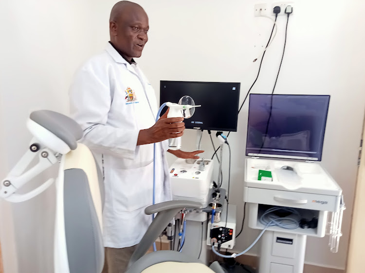 Dr George Got demonstrates how to operate the new ENT workstation at Avenue Hospital in Kisumu.
