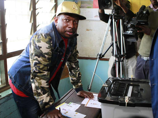 A file photo of Nairobi Senator Mike Sonko voting at Bidii primary polling station during Jubilee primaries. /MONICAH MWANGI