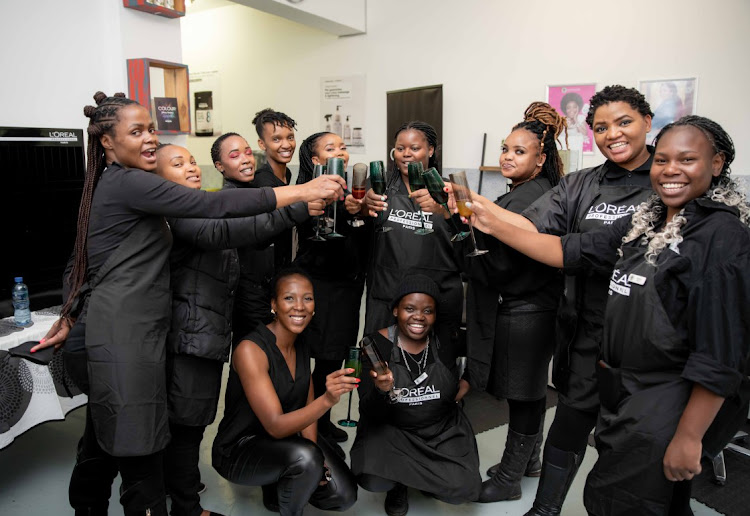 Hyde Park-based Nubian Crown Hair Studio owner Tshireletso Yvonne Diogo with staff.