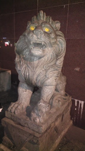 Stone Lion With Yellow Eye