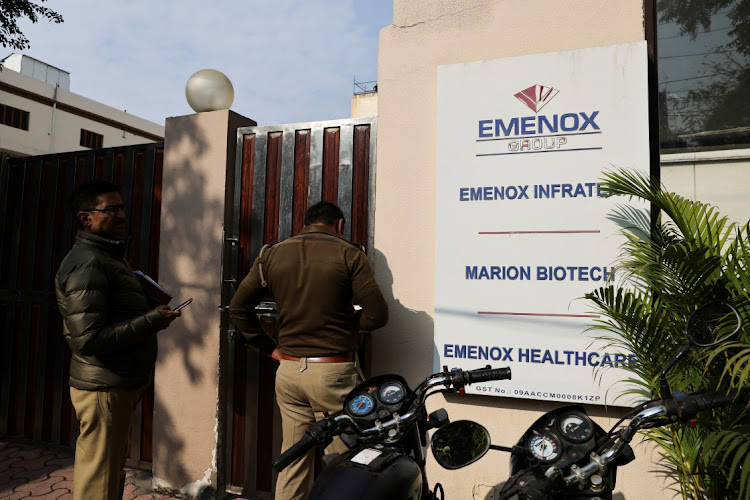 Police are shown at the gate of an office of Marion Biotech, in Noida, India. File photo: ANUSHREE FADNAVIS/REUTERS