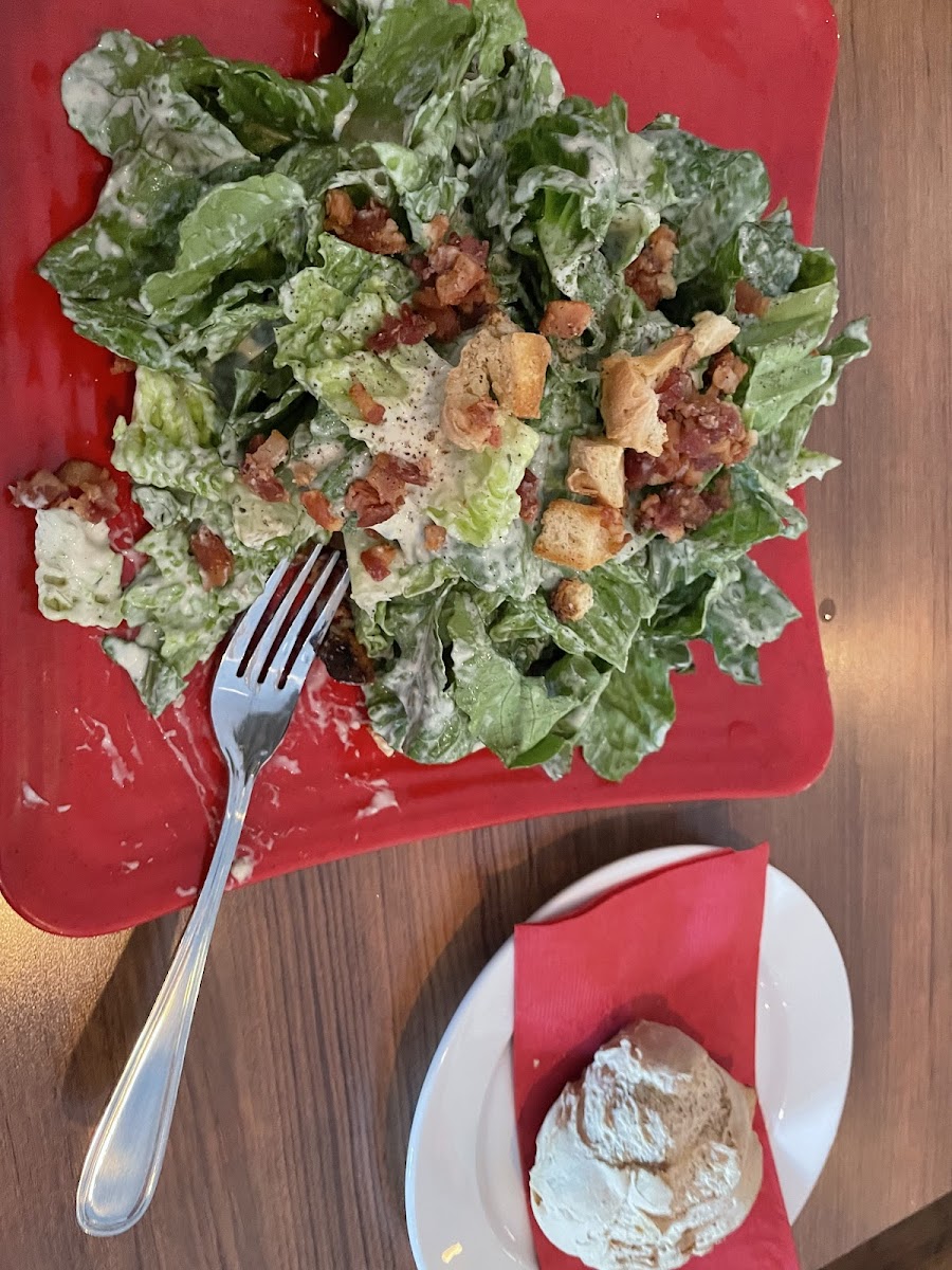 Caesar salad and roll